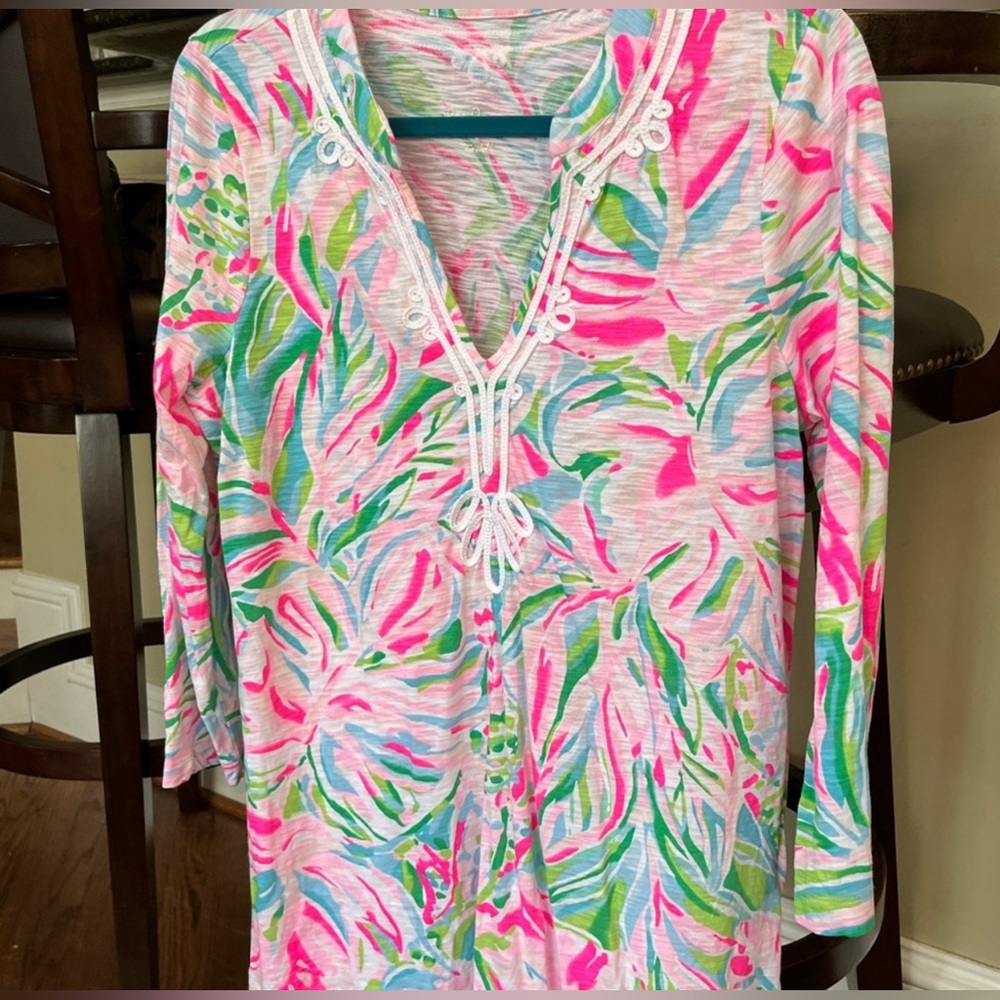 Kaia tunic size large I don’t see anything wrong with it bought and never wore
